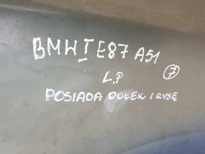 BMW E87 PRZEDNI BŁOTNIK LEWY PRZÓD MONTEGOBLAU A51