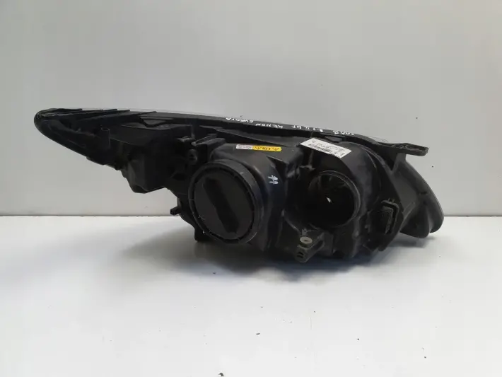 Saab 93 9-3 II LIFT 07-11r PRZEDNIA LAMPA LEWA lewy przód EUROPA 1EL010317