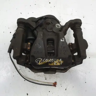 Toyota Corolla XII E21 TYLNY ZACISK HAMULCOWY lewy tył KIEROWCY